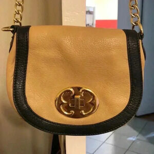 Emma Fox two-toned saddle crossbody bag.